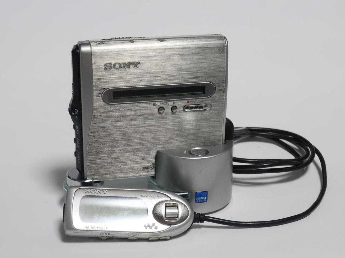 Sony MZ-NH1 Hi-MD Walkman with its wired controller and battery charger.